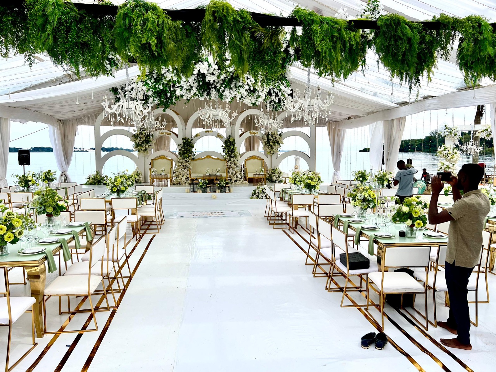 Decorated event setting with people working on site