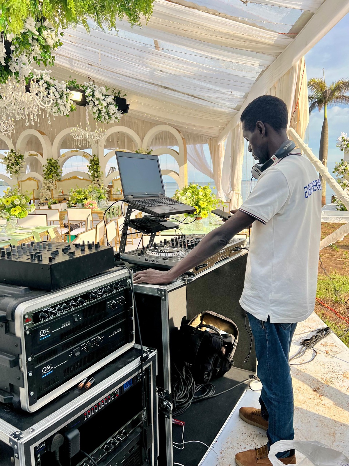 Team member operating a sound console